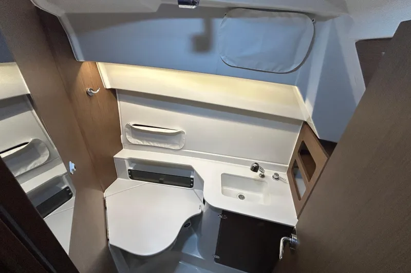 Slide: The Image of Interior cabin of 2020 Beneteau Antares boat with modern design and cozy sleeping area. - 6