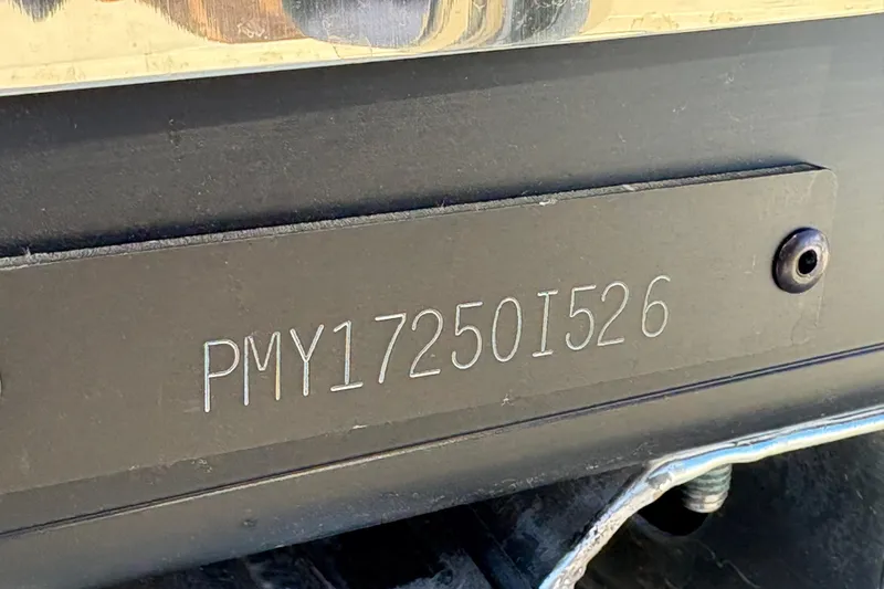 Slide: The Image of Hull identification number on 2026 Premier 210 Sunsation RL boat. - 18