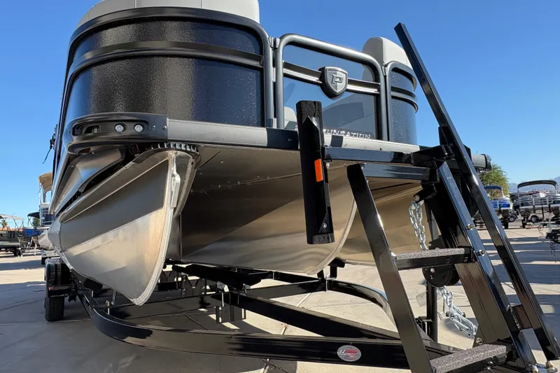 Slide: The Image of 2026 Premier 210 Sunsation RL pontoon boat on trailer, close-up view. - 5