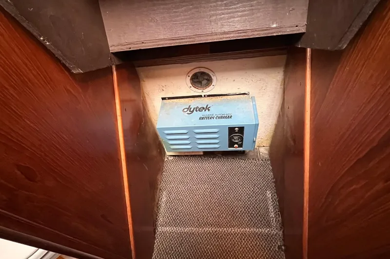 Slide: The Image of Marine battery charger in 1989 Egg Harbor 33 Convertible boat interior. - 40