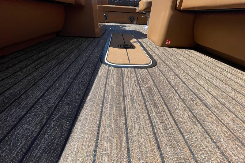 Slide: The Image of 2026 Harris Solstice 250 SLDH boat interior with stylish wood-patterned flooring. - 15
