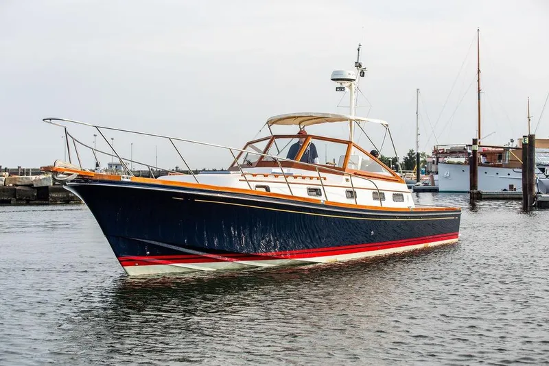 Slide: The Image of 1994 Little Harbor Express yacht in marina, featuring sleek design and classic styling. - 0