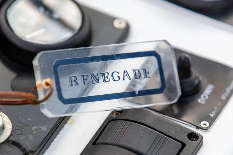 Slide: The Image of Close-up of a 1994 Little Harbor Express boat control panel with "Renegade" tag. - 14