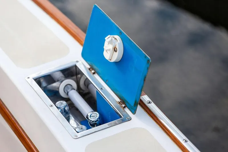 Slide: The Image of Open hatch on 1994 Little Harbor Express boat, showing interior components. - 41