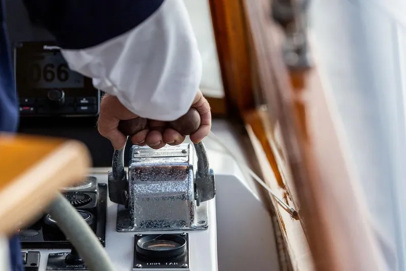 Slide: The Image of Hand operating throttle on 1994 Little Harbor Express boat, close-up view. - 45