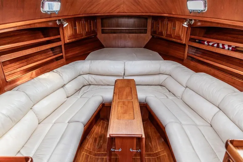 Slide: The Image of Luxurious 1994 Little Harbor Express yacht interior with plush seating and wooden accents. - 5