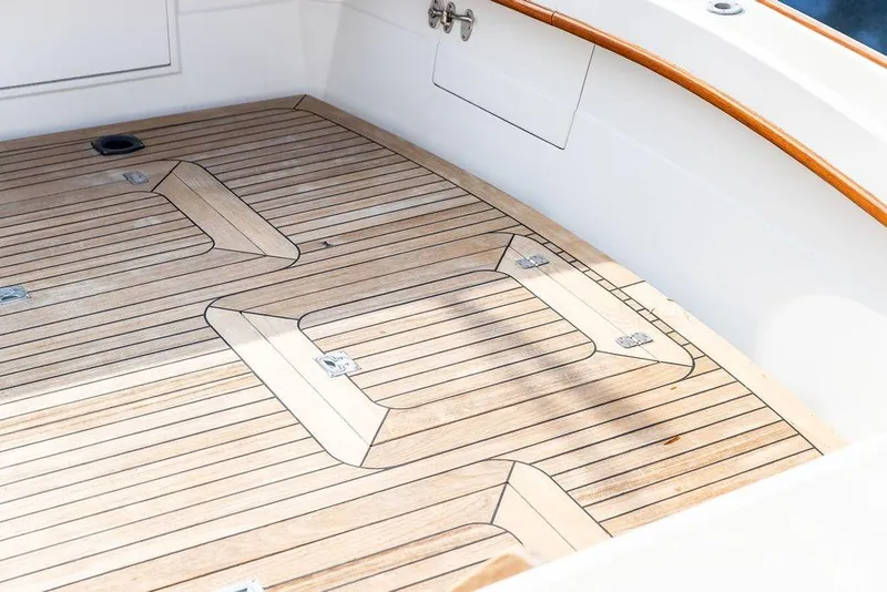 Slide: The Image of Teak deck of 1994 Little Harbor Express boat, showcasing elegant wood finish. - 50