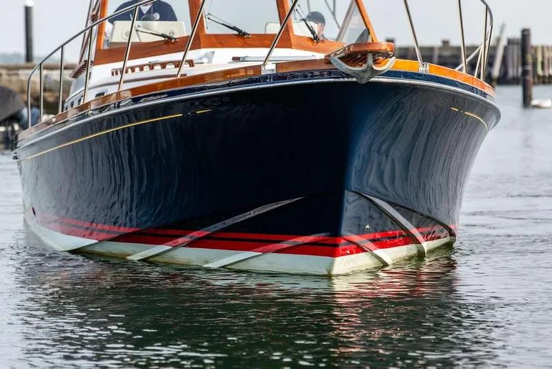 Slide: The Image of 1994 Little Harbor Express boat with sleek design on calm water. - 67
