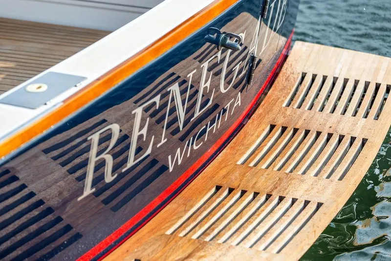 Slide: The Image of Stern of 1994 Little Harbor Express boat with "Renegade" and "Wichita" lettering. - 75