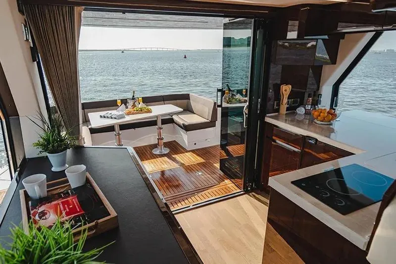 Slide: The Image of Luxurious interior of 2023 Galeon 470 Sky yacht with ocean view and modern amenities. - 16