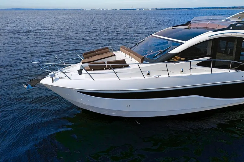 Slide: The Image of 2023 Galeon 470 Sky yacht on open water, showcasing sleek design and luxury features. - 24
