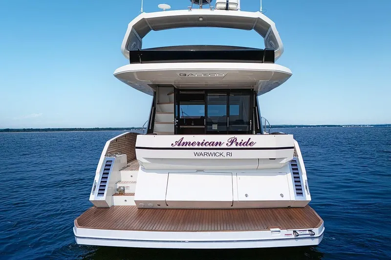 Slide: The Image of 2023 Galeon 470 Sky yacht on water, rear view, named "American Pride," Warwick, RI. - 8