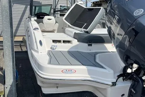 Slide: The Image of 2021 Chaparral 21 SSi OB boat with outboard motor, docked in marina. - 18