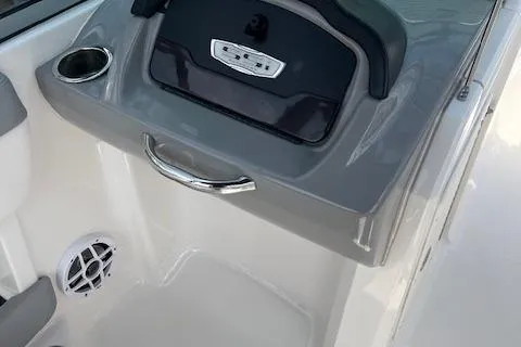 Slide: The Image of 2021 Chaparral 21 SSi OB boat interior with speaker and control panel. - 4