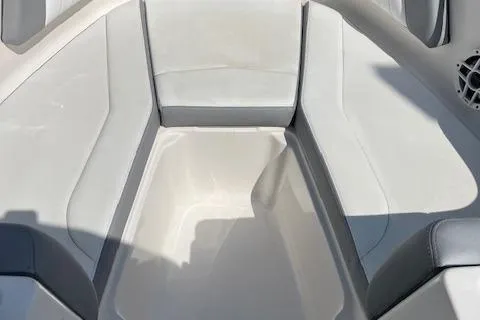 Slide: The Image of 2021 Chaparral 21 SSi OB boat interior with spacious seating and modern design. - 5
