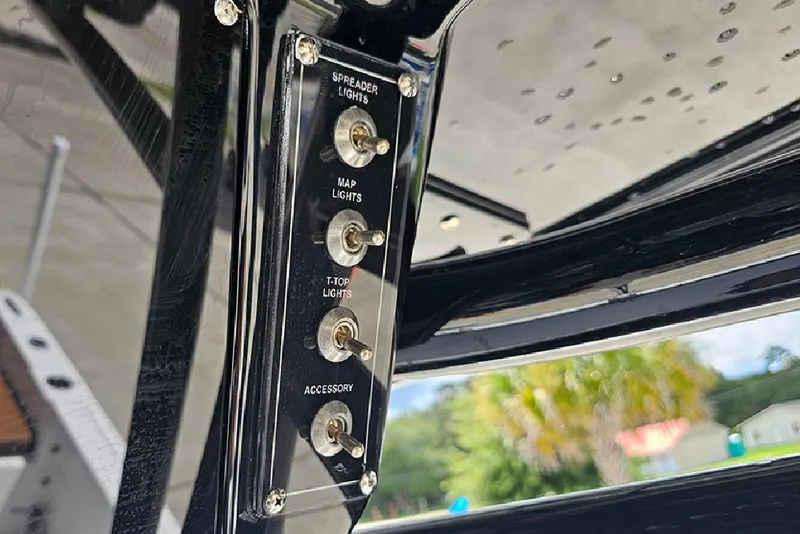 Slide: The Image of Switch panel on 2026 Sea Pro 225 Sandbar boat with labeled light controls. - 24