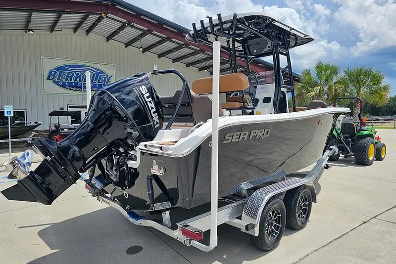 Slide: The Image of 2026 Sea Pro 225 Sandbar boat with Suzuki engine on trailer at dealership. - 3