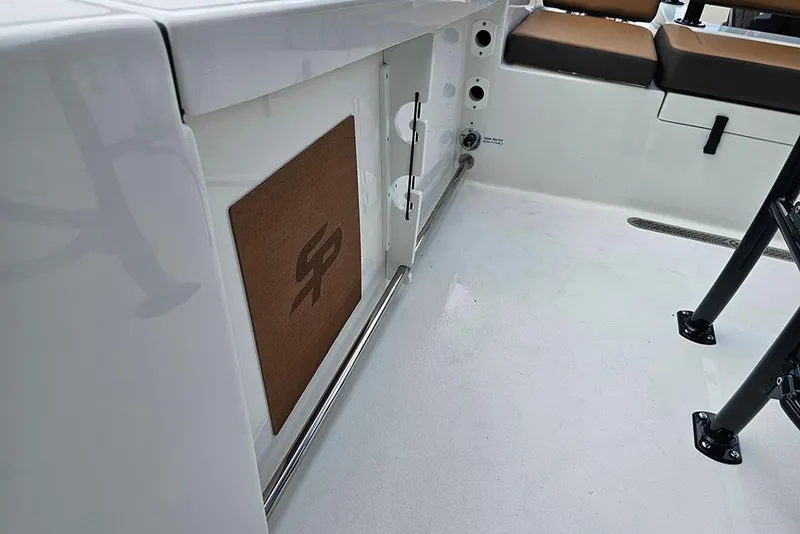 Slide: The Image of 2026 Sea Pro 225 Sandbar boat interior with seating and storage features. - 36