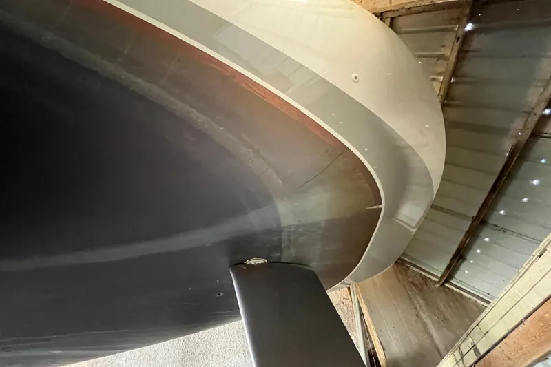 Slide: The Image of Beneteau First 40.7 sailboat hull and keel in storage, 2001 model. - 27