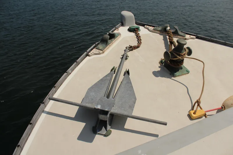 Slide: The Image of Bow of 1992 Novi 32 Downeast boat with anchor and mooring equipment. - 13