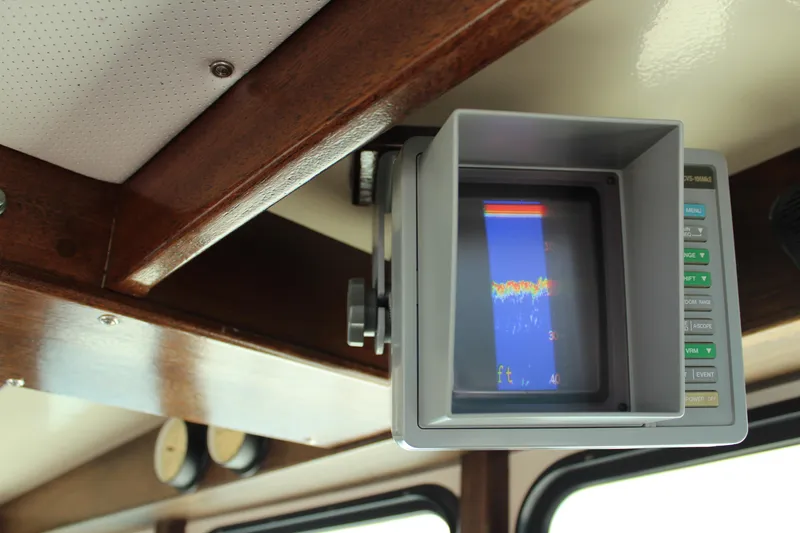Slide: The Image of Fishfinder display on 1992 Novi 32 Downeast boat, mounted in wooden cabin interior. - 37