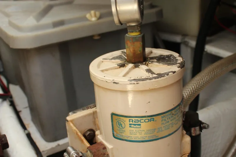 Slide: The Image of Fuel filter system in a 1992 Novi 32 Downeast boat engine compartment. - 45