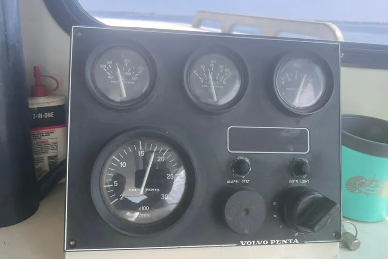 Slide: The Image of Instrument panel of a 1992 Novi 32 Downeast boat with Volvo Penta gauges. - 52