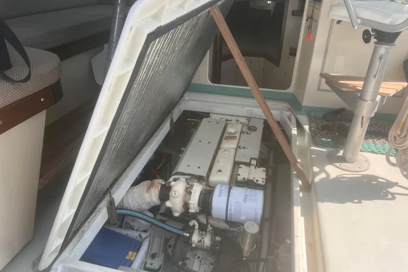 Slide: The Image of Engine compartment of a 1992 Novi 32 Downeast boat, open for maintenance. - 60