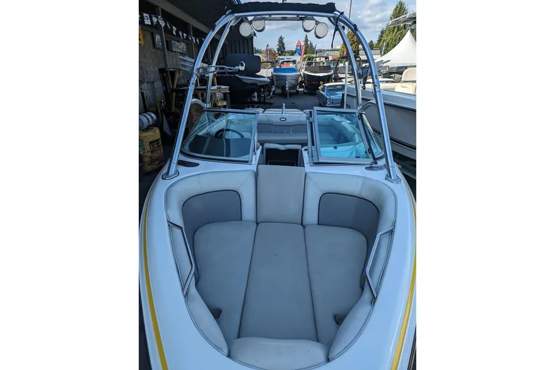 Slide: The Image of 2005 Supra Launch 21 V boat interior with seating and wakeboard tower. - 15