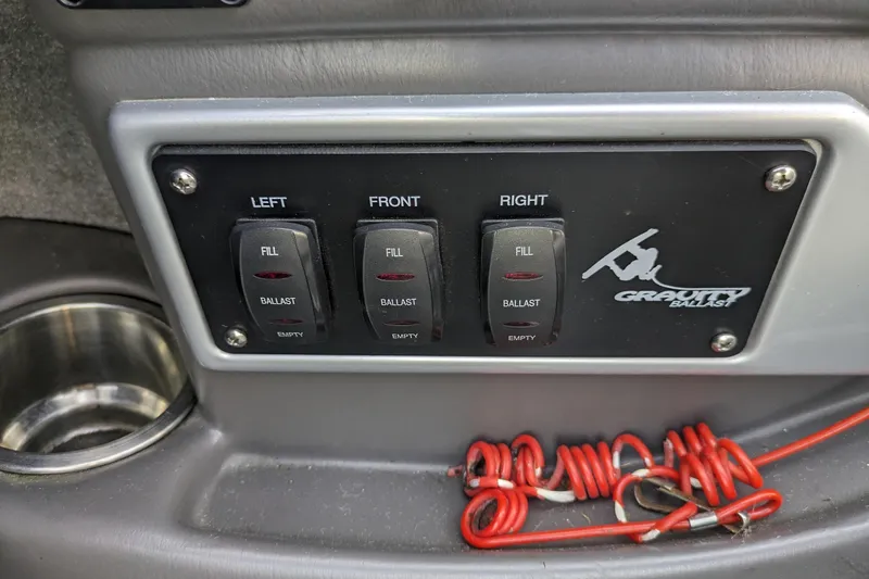 Slide: The Image of 2005 Supra Launch 21 V ballast control panel with fill and empty switches. - 21