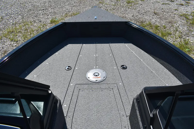 Slide: The Image of 2026 Lund 1800 Explorer Sport boat deck, featuring a spacious, carpeted surface. - 14