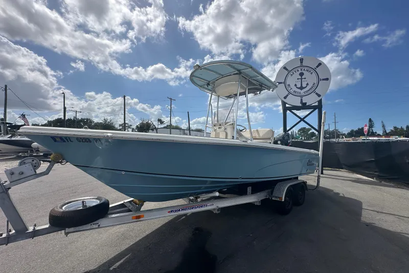 Slide: The Image of 2014 Sea Chaser 210 LX Bay Runner boat interior with seating and console. - 8