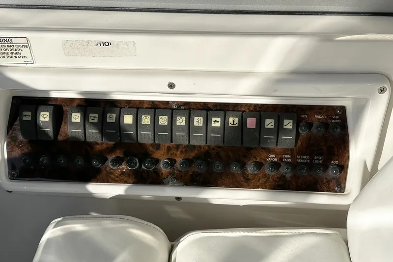 Slide: The Image of Control panel of a 2008 Regal 3360 Window Express boat. - 15