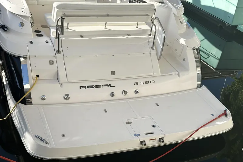 Slide: The Image of 2008 Regal 3360 Window Express boat stern with swim platform and seating area. - 7