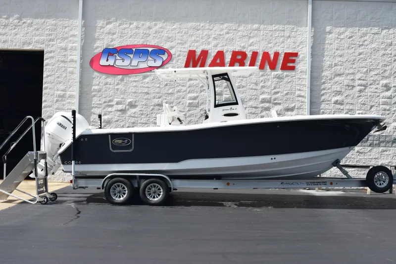 The Image of 2026 Sea Hunt Gamefish 27 boat on trailer at GSPS Marine dealership. - 1