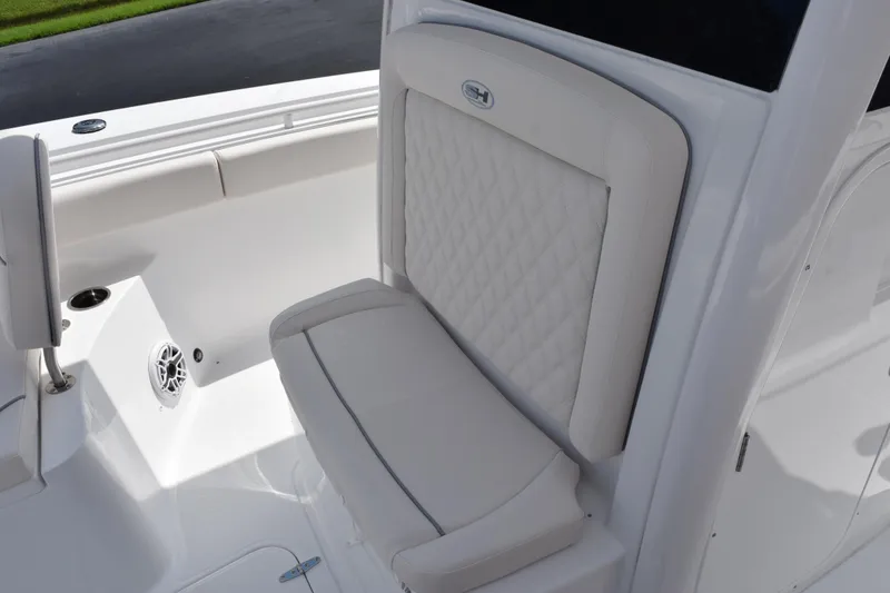 Slide: The Image of 2026 Sea Hunt Gamefish 27 Forward Seating, featuring luxurious white cushioned seat. - 19