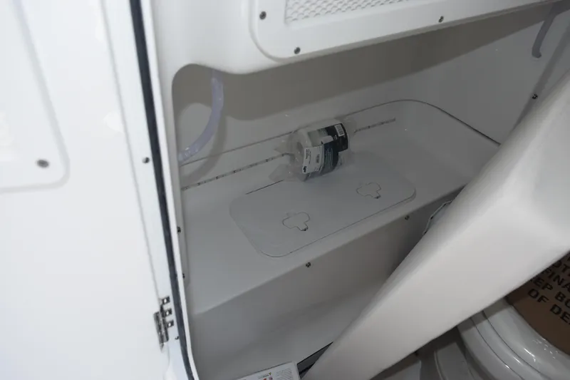 Slide: The Image of Interior storage compartment of 2026 Sea Hunt Gamefish 27 Forward Seating boat. - 22