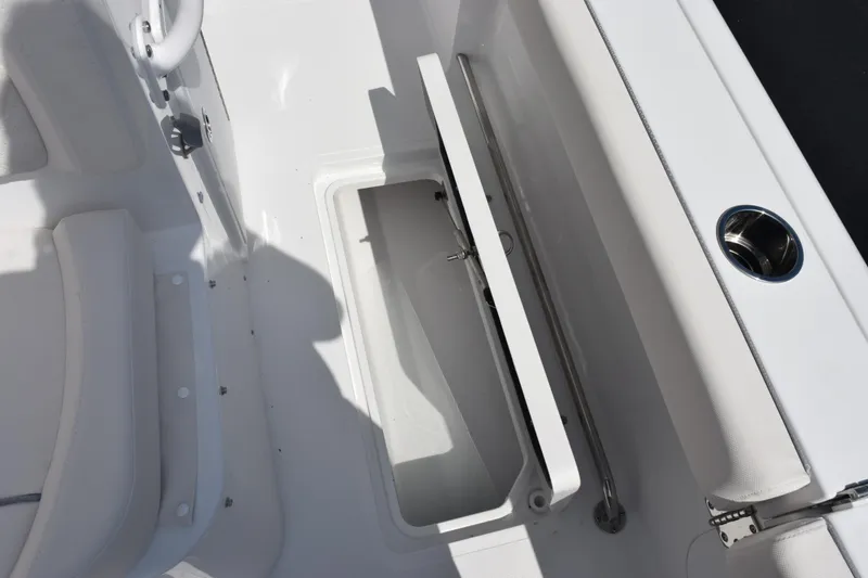 Slide: The Image of 2026 Sea Hunt Gamefish 27 Forward Seating storage compartment detail. - 27