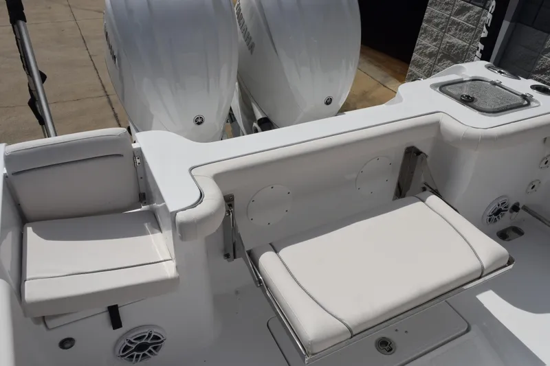 Slide: The Image of 2026 Sea Hunt Gamefish 27 boat with forward seating and dual engines. - 8