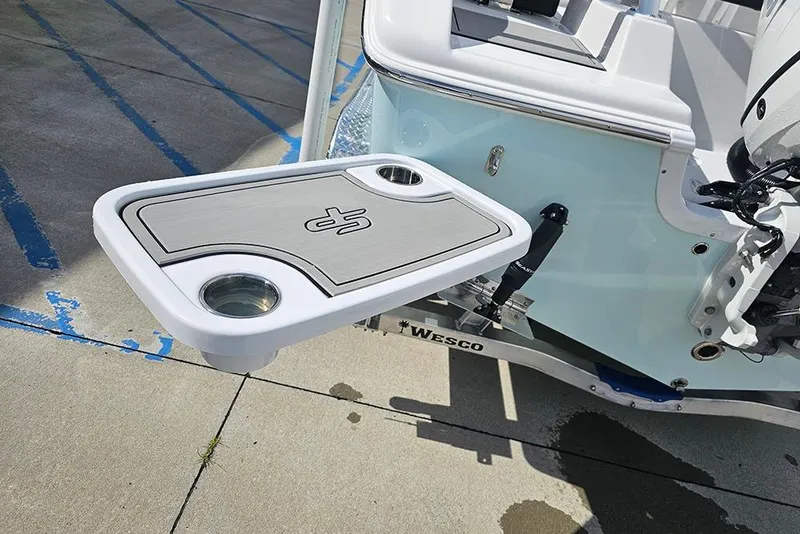 Slide: The Image of 2026 Sea Pro 225 Sandbar boat with foldable table and cup holders. - 10