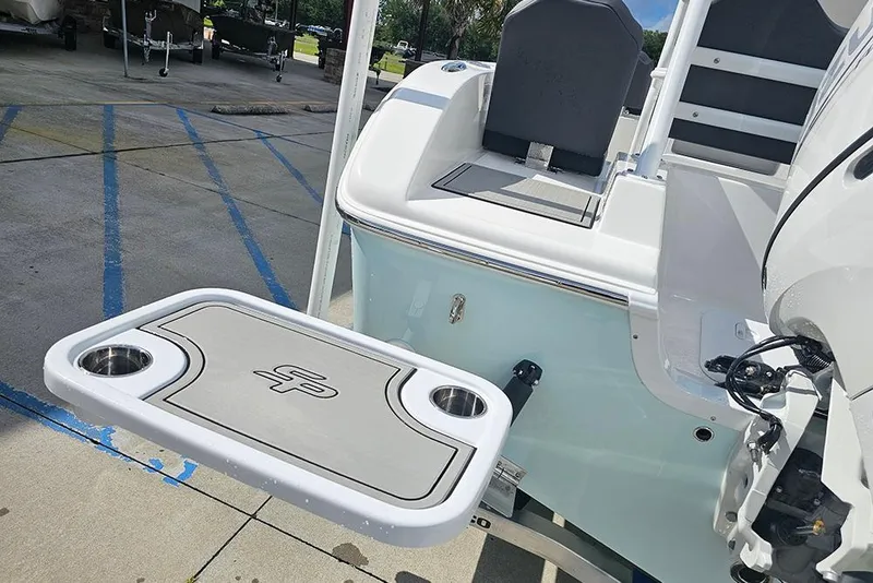 Slide: The Image of 2026 Sea Pro 225 Sandbar boat with swim platform and cup holders. - 11