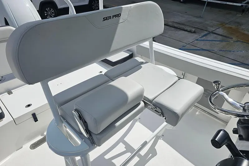 Slide: The Image of 2026 Sea Pro 225 Sandbar boat seating and steering wheel, showcasing modern design. - 17