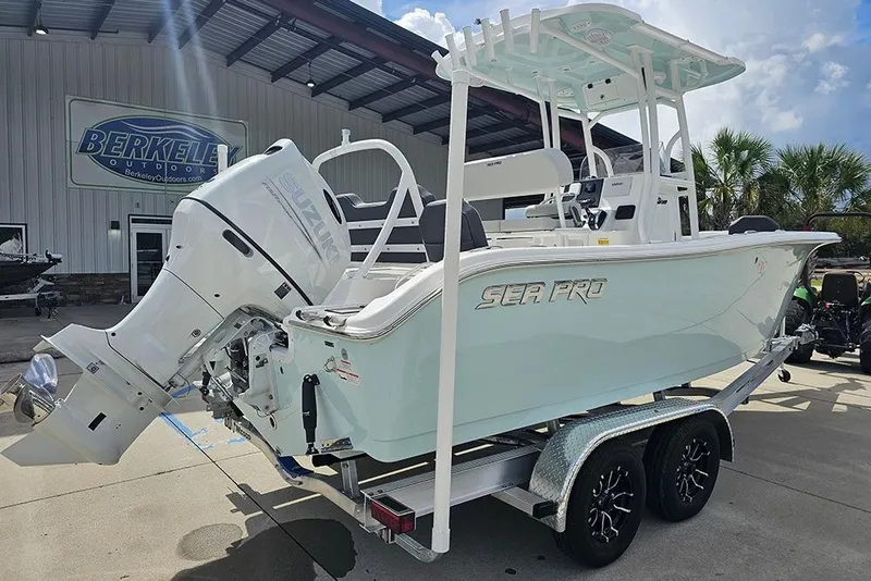 Slide: The Image of 2026 Sea Pro 225 Sandbar boat on trailer, displayed at Berkeley Outdoors. - 3