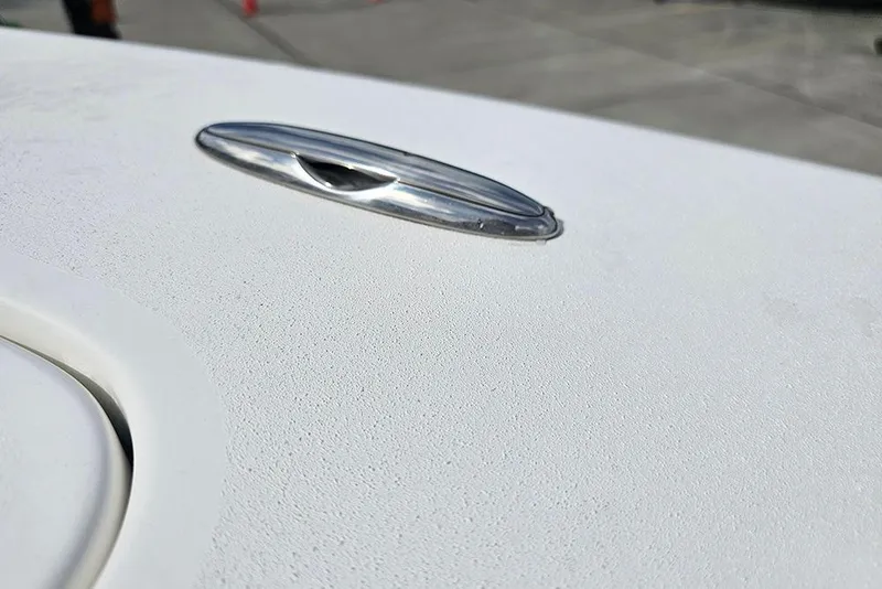 Slide: The Image of Close-up of 2026 Sea Pro 225 Sandbar boat deck with chrome detail. - 30