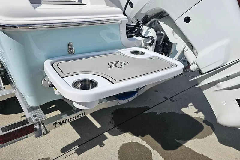 Slide: The Image of 2026 Sea Pro 225 Sandbar boat with swim platform and cup holders. - 9