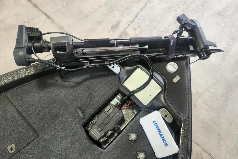 Slide: The Image of 2014 Phoenix 920 ProXP boat with Lowrance equipment and trolling motor setup. - 7