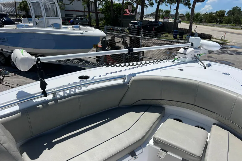 Slide: The Image of 2021 Sportsman Open 232 Center Console boat with seating and trolling motor. - 13