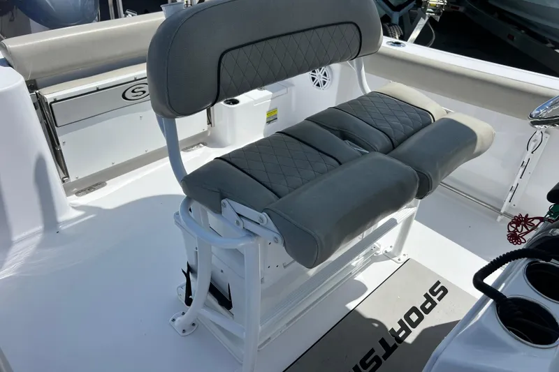 Slide: The Image of 2021 Sportsman Open 232 Center Console boat seat with gray cushioned upholstery. - 18