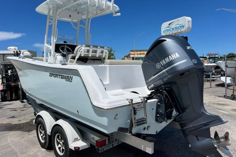 Slide: The Image of 2021 Sportsman Open 232 Center Console boat with Yamaha engine on trailer. - 4