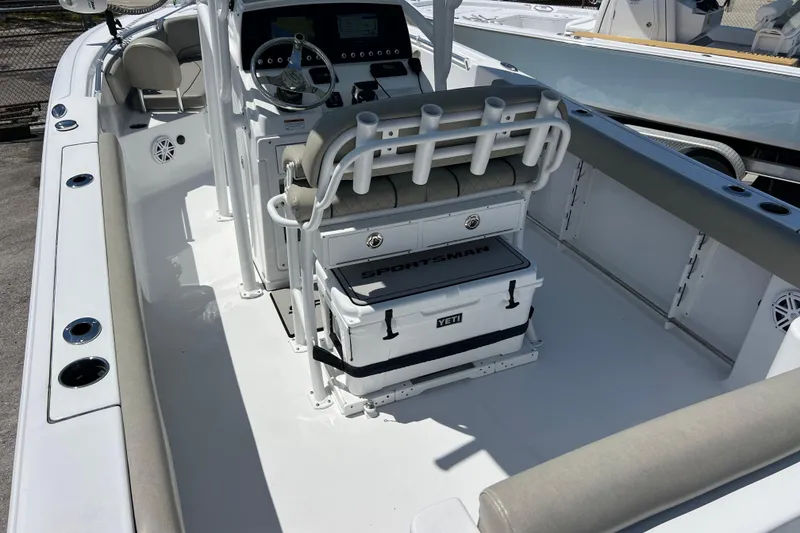 Slide: The Image of 2021 Sportsman Open 232 Center Console boat interior with Yeti cooler and seating. - 7